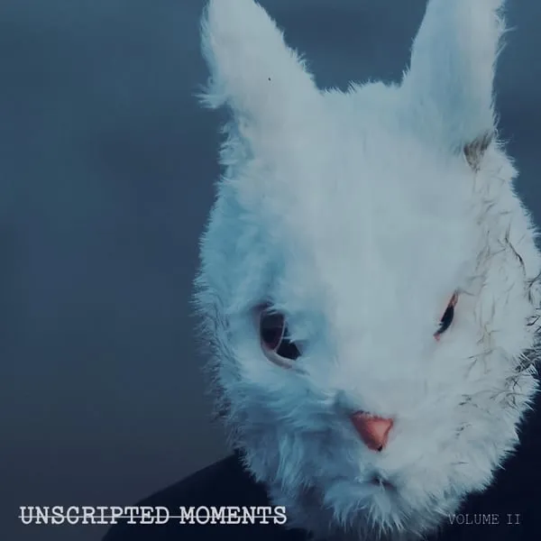 Unscripted Moments vol 2 album cover. The cover portraits a band member wearing a rabbit mask along with the album title.